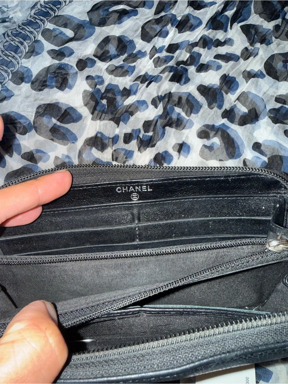 Authentic CHANEL Black Caviar Leather Zip-Around Wallet with Embossed CC